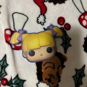 Funko Pop Figure with Yellow Hair and Purple Accents